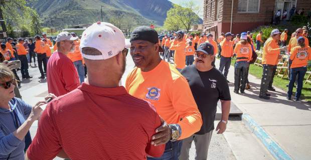 Former NFL great and Heisman Trophy winner Herschel Walker meets fans during the Kyle Petty Charity Rides stop in Glenwood Springs Sunday.