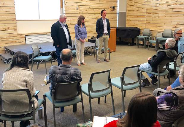 Colorado state representatives Perry Will, left, Julie McCluskie and Dylan Roberts field questions from an audience in Basalt last week.