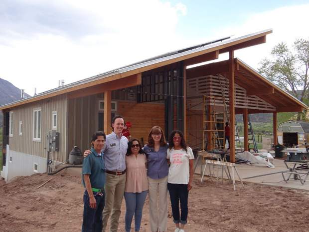 Colorado State Rep. Dylan Roberts (second from left) and State Rep. Julie McCluskie (second from right) meet with homeowners at the Basalt Vista affordable housing project last week.