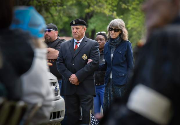 Members of the audience stand together during the 2019 Memorial Day ceremony held at Rosebud Cemetery in Glenwood on Monday.