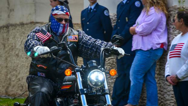 A member of the Western Slope Memorial Riders leaves with the rest of the 