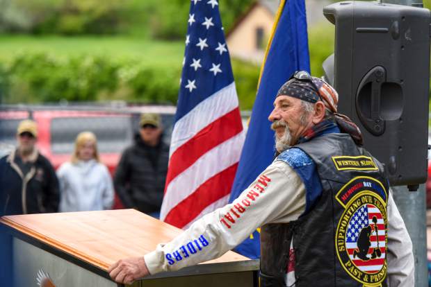 A member of the Western Slope Memorial Riders addresses the audience during the 2019 Memorial Day ceremony held at Rosebud Cemetery in Glenwood on Monday.