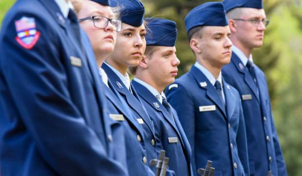 Members of the Glenwood Springs High School Air Force JROTC stand together during the 2019 Memorial Day ceremony held at Rosebud Cemetery in Glenwood Springs on Monday.